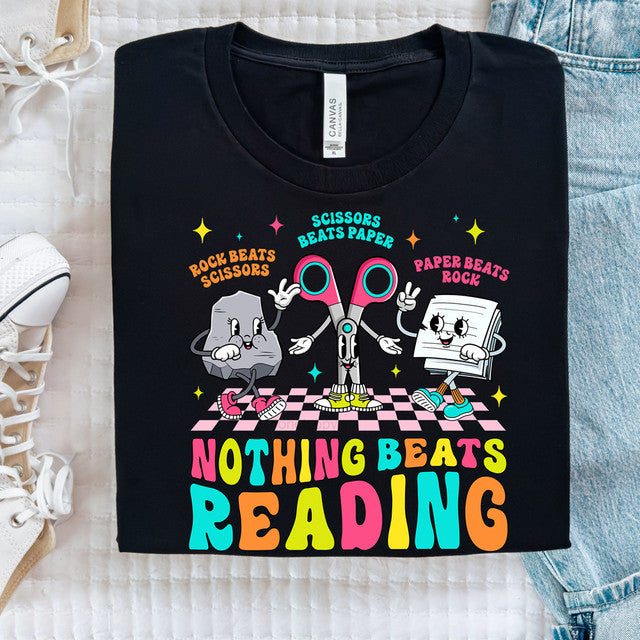 Black t-shirt with colorful graphic design on a light background