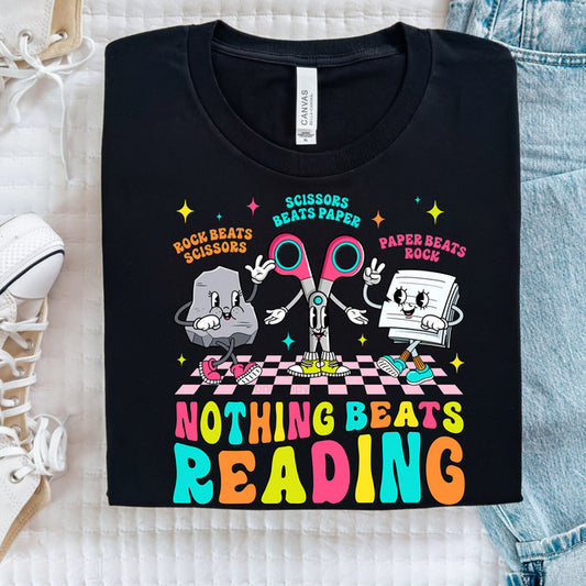 Black t-shirt with colorful graphic design on a light background