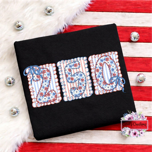 Black fabric with floral embroidered numbers '250' on a red and white wooden surface.
