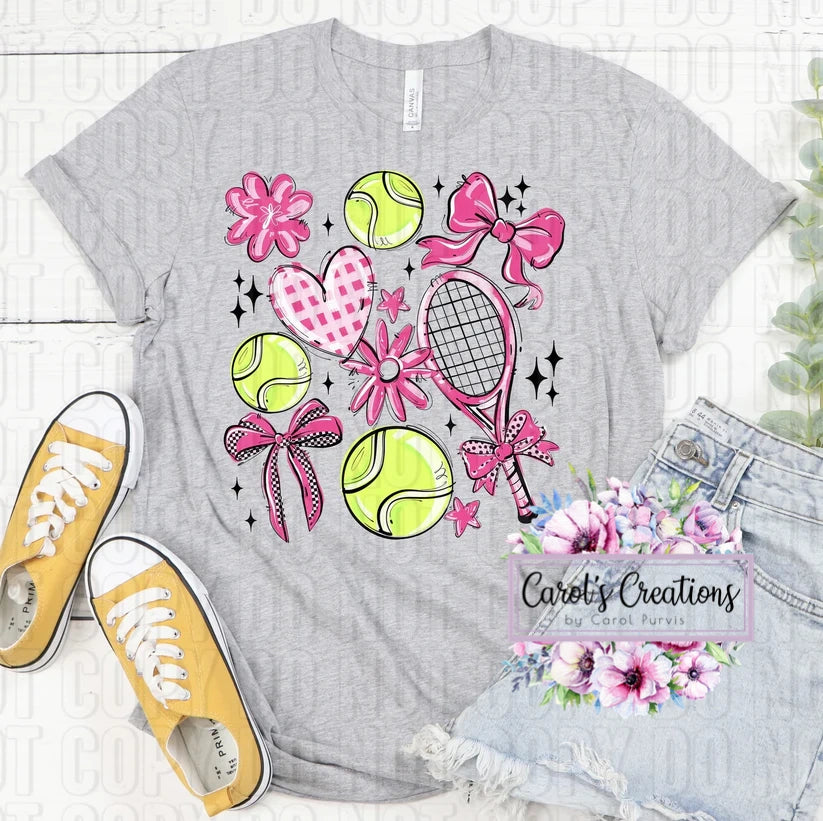 Gray t-shirt with tennis-themed design, yellow sneakers, and denim shorts on a light wooden surface.
