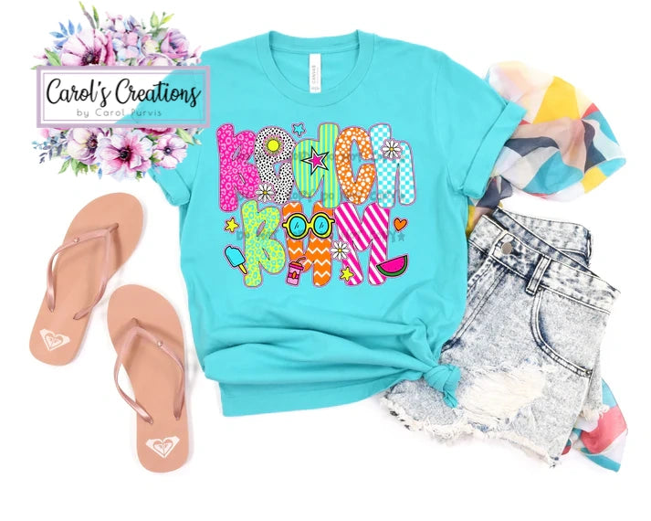 Turquoise t-shirt with colorful text, sandals, shorts, and floral design on a white background