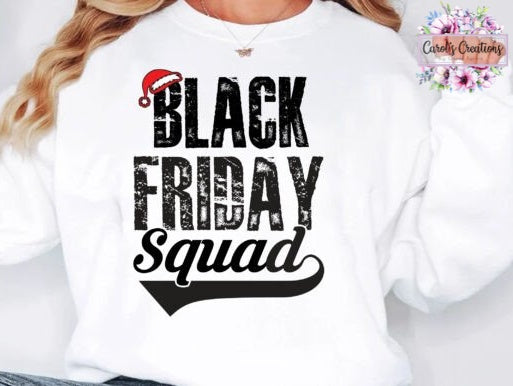 A white crewneck sweatshirt featuring a distressed black graphic that reads 'BLACK FRIDAY Squad' with a small red Santa hat accent, worn by a model.