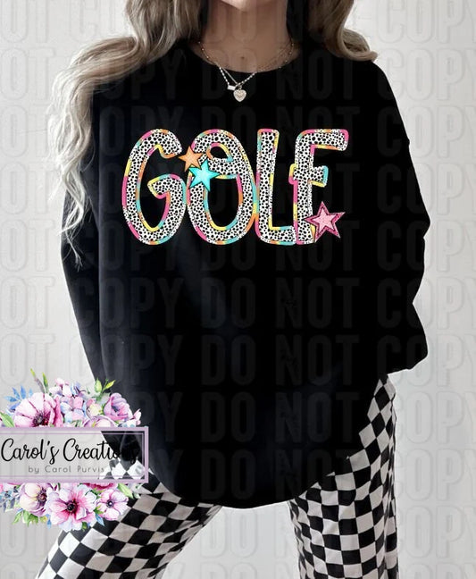 Person wearing a black sweatshirt with colorful 'GOLF' text, standing against a white background.