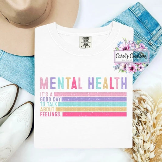 T-shirt with 'Mental Health' message on a white background
