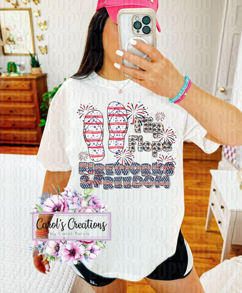 Person wearing a white t-shirt with patriotic design, taking a mirror selfie.