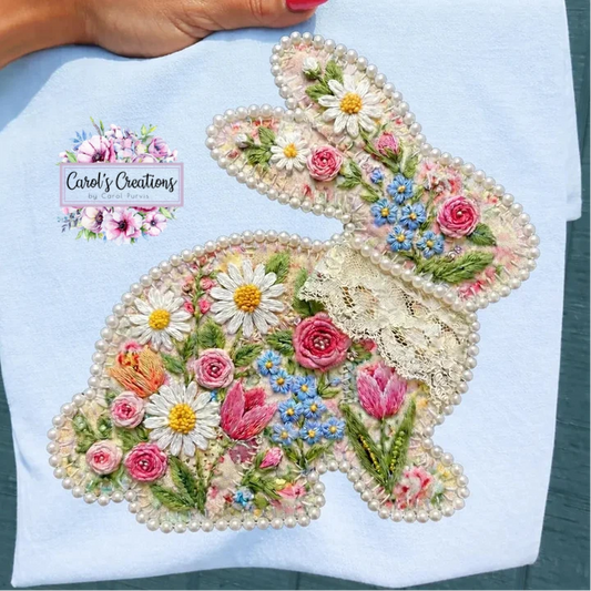 Floral embroidered Bunny on light blue shirt