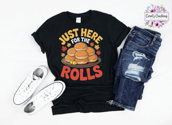 A black graphic t-shirt featuring a stack of hot dogs with the text 'JUST HERE FOR THE ROLLS' in yellow and red, styled in a flat lay with blue jeans, white sneakers, and a 'Carol's Questions' brand logo on a white background.