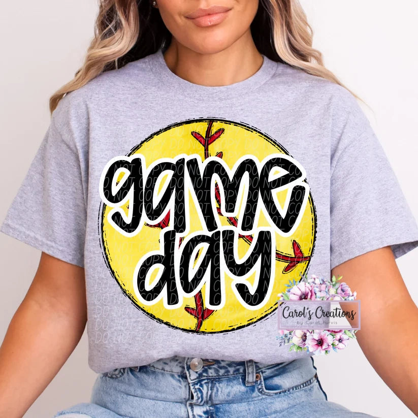 Person wearing a gray t-shirt with 'game day' graphic design on a plain background