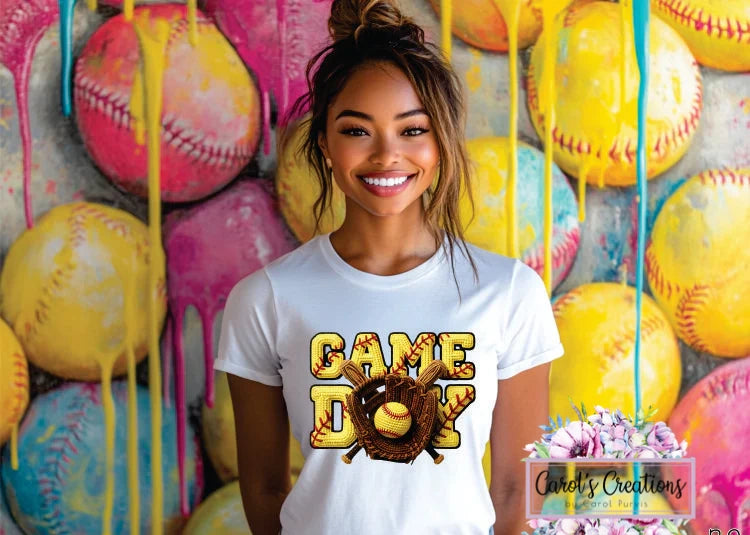 Woman wearing a 'Game Day' t-shirt in front of a colorful background with sports balls.