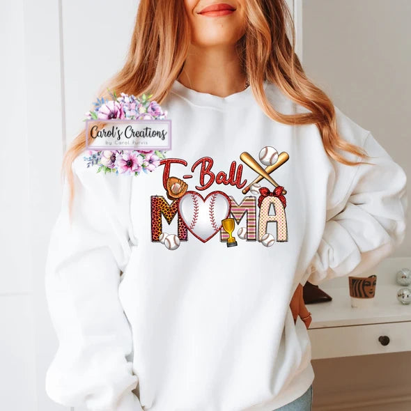 Person wearing a white sweatshirt with 'Baseball Mama' design and 'Carol's Creations' branding.