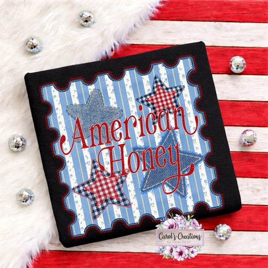 Decorative pillow with 'American Honey' text and star designs on a wooden surface.