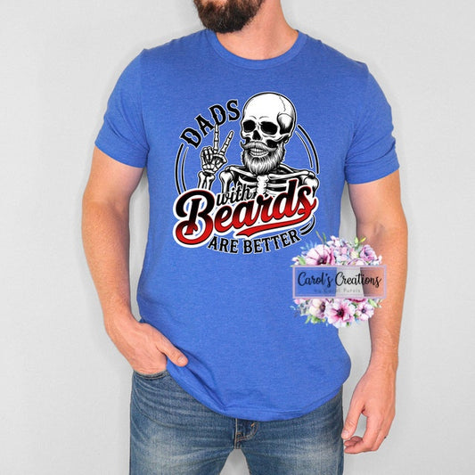 Person wearing a blue t-shirt with a graphic design and text, on a plain background.