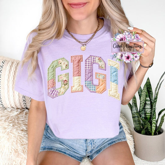 Person wearing a pastel 'GIG' shirt with floral and checkered patterns, holding a card with 'Carole's Creations'.