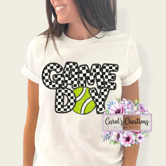 Person wearing a white t-shirt with 'Game Over' design and tennis ball graphic, with 'Carol's Creations' branding.