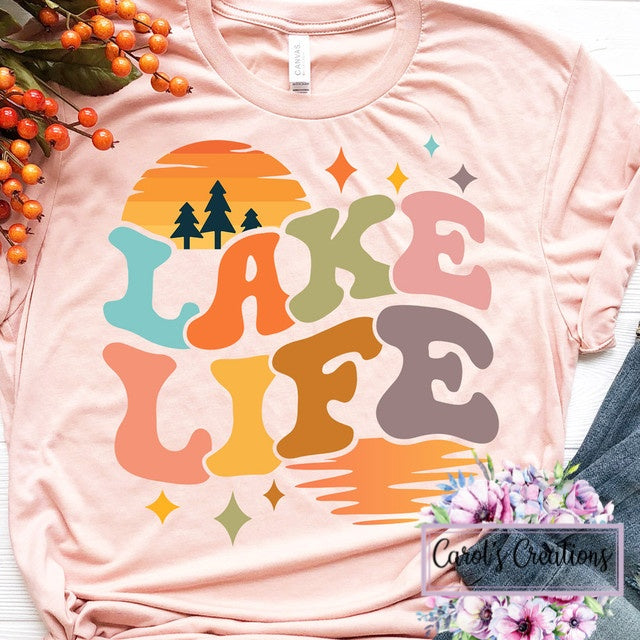 Pink t-shirt with 'Lake Life' design on a white background
