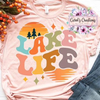 Pink t-shirt with 'Lake Life' design on a light pink background