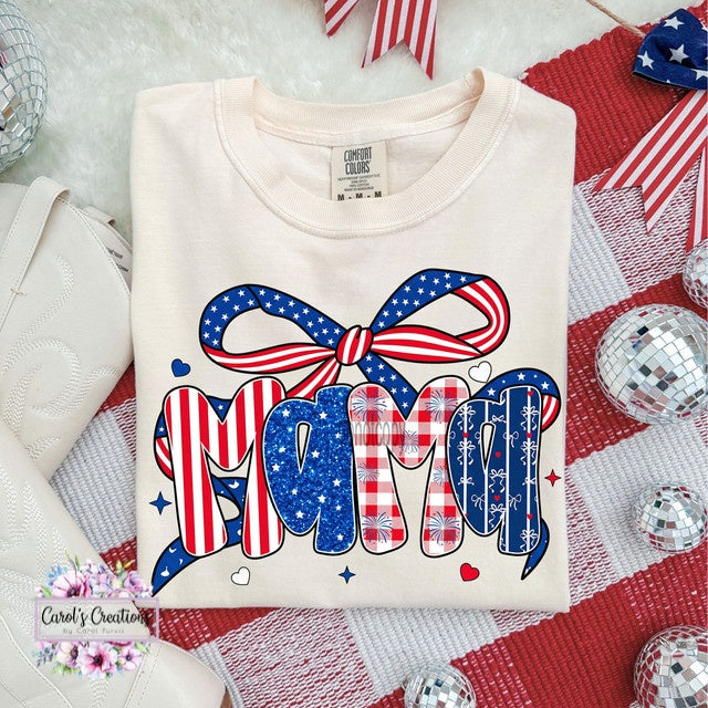 White sweatshirt with 'MAMA' in American flag design on a decorative background