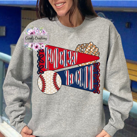 Person wearing a gray sweatshirt with sports-themed design and 'Carols Creations' branding.