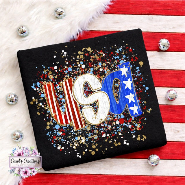Black pillow with 'USA' design on a red and white striped background