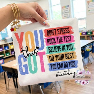 Motivational poster with colorful text in a classroom setting