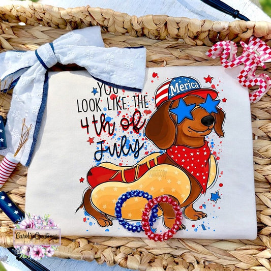 T-shirt with a dachshund design and text on a woven basket background